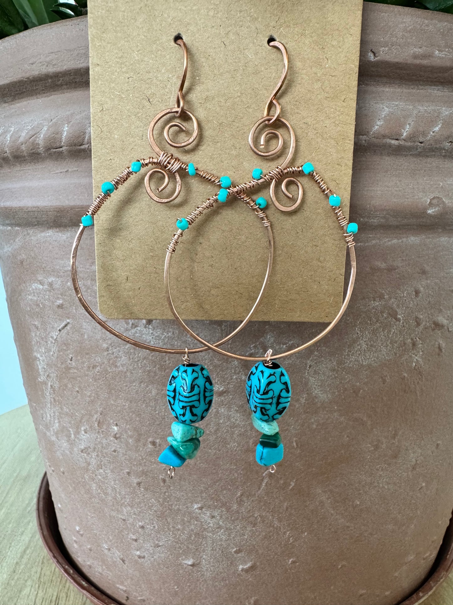 Copper spiral hoop earrings with turquoise beads