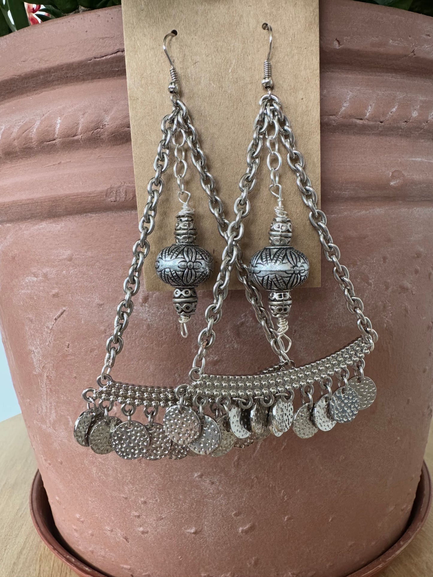 Large silver earrings with silver center beads