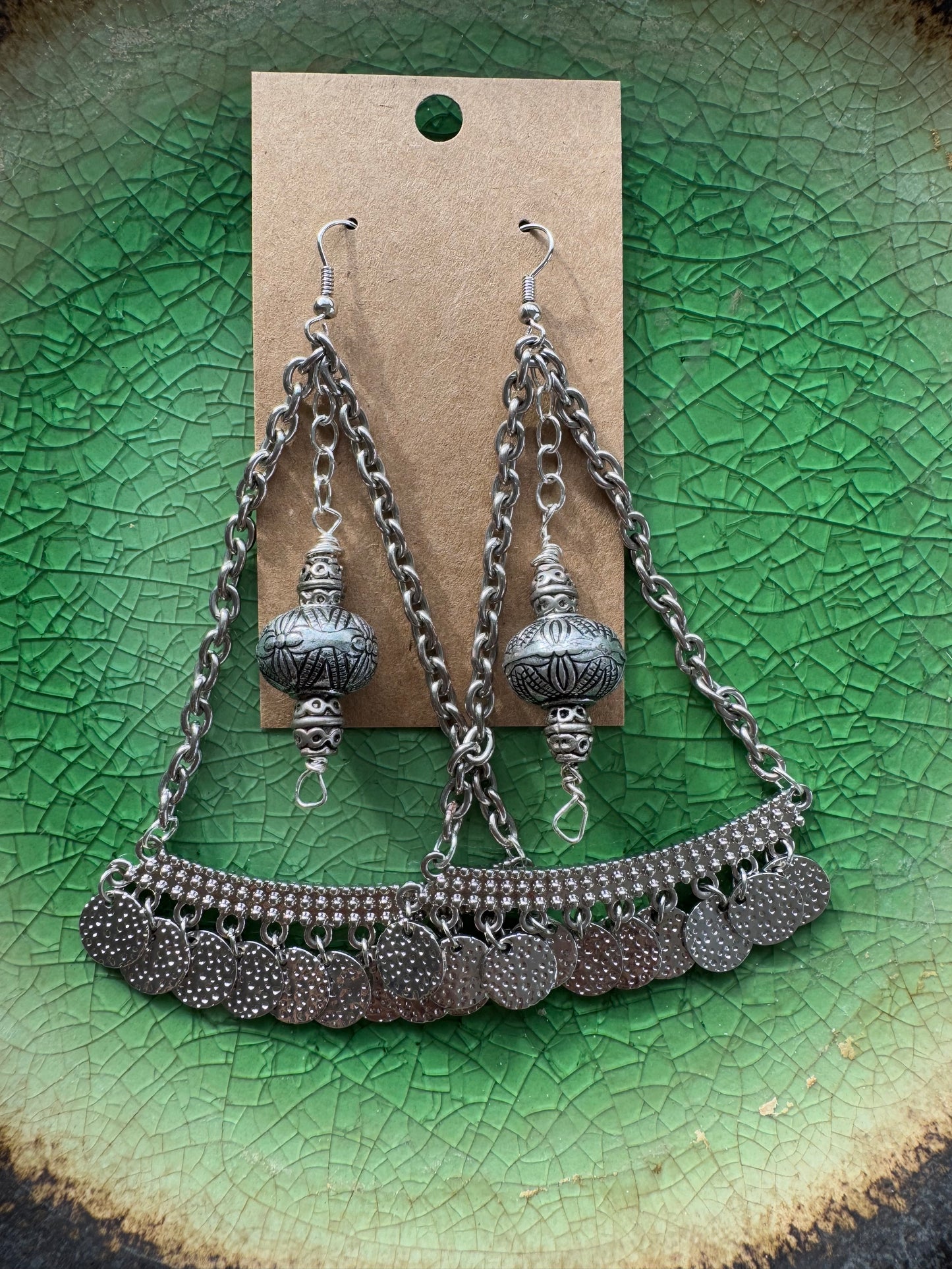 Large silver earrings with silver center beads