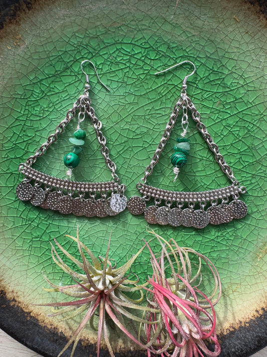 Large silver earrings with green center beads