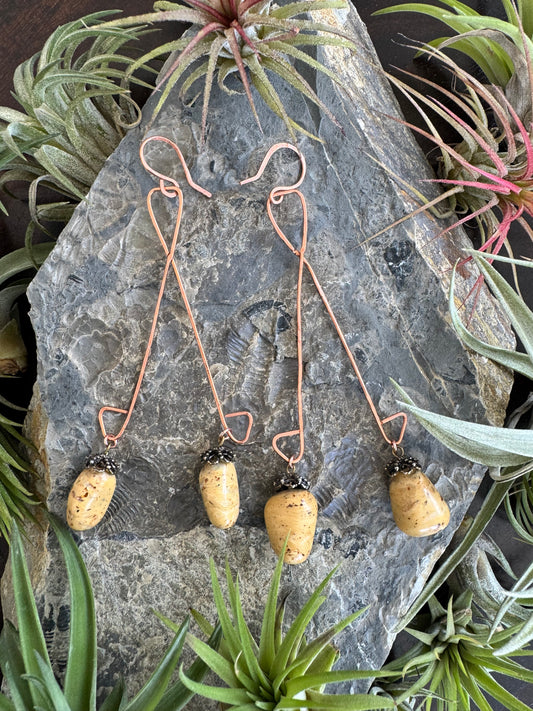 Copper earrings with neutral beads