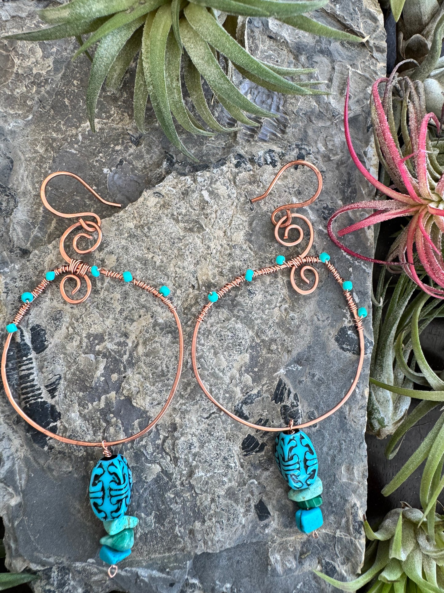 Copper spiral hoop earrings with turquoise beads