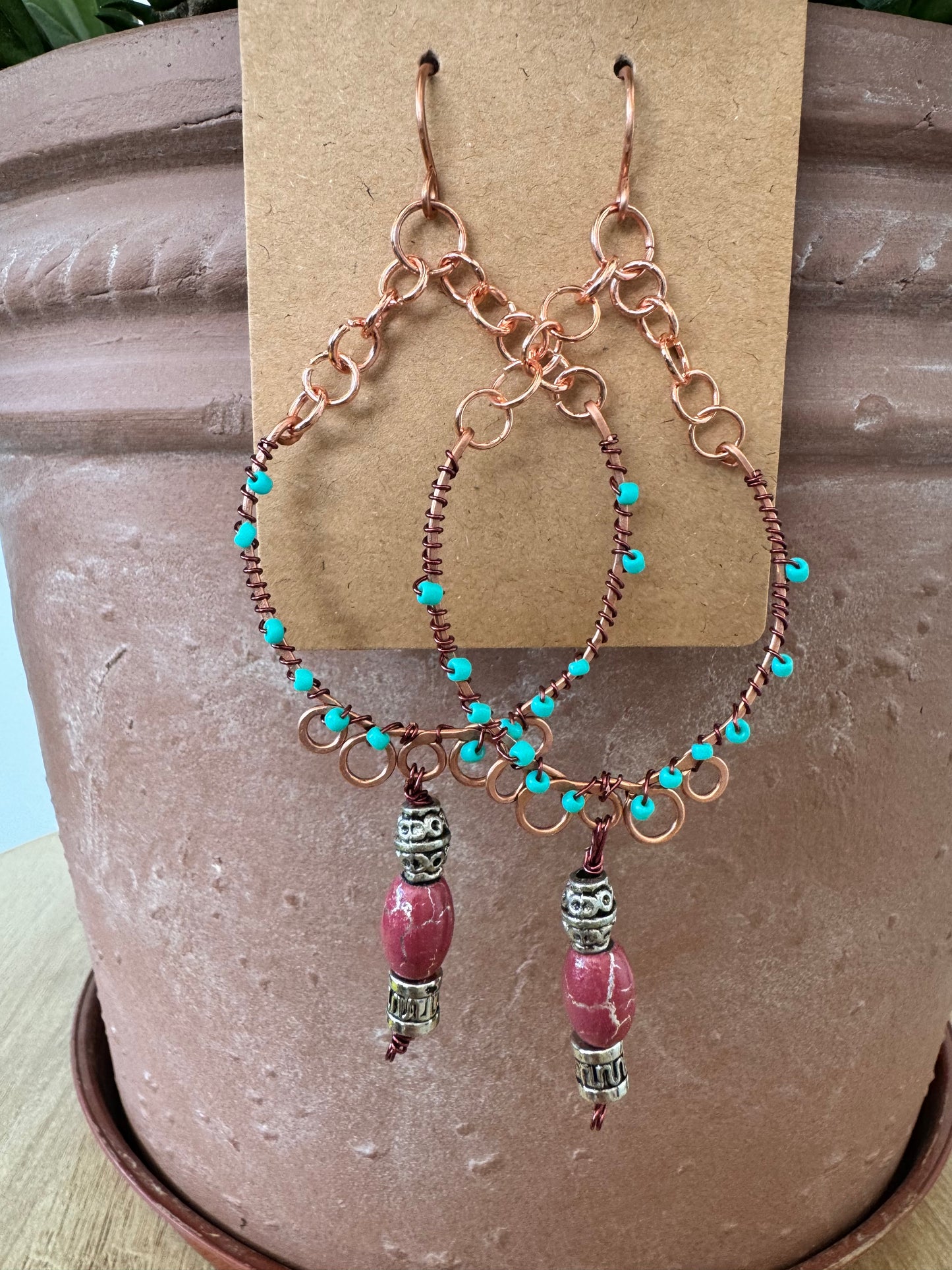 Copper hoop earrings with beads